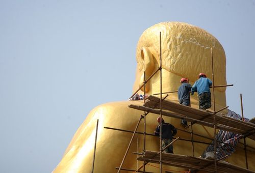 大背头弥勒金佛的由来