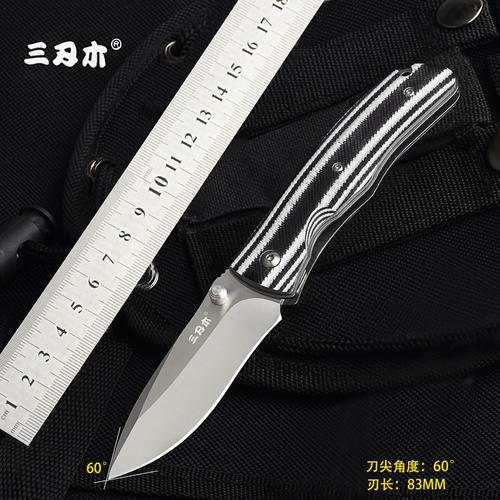 刚入了把三刃木763，铝柄好还是G10柄好？